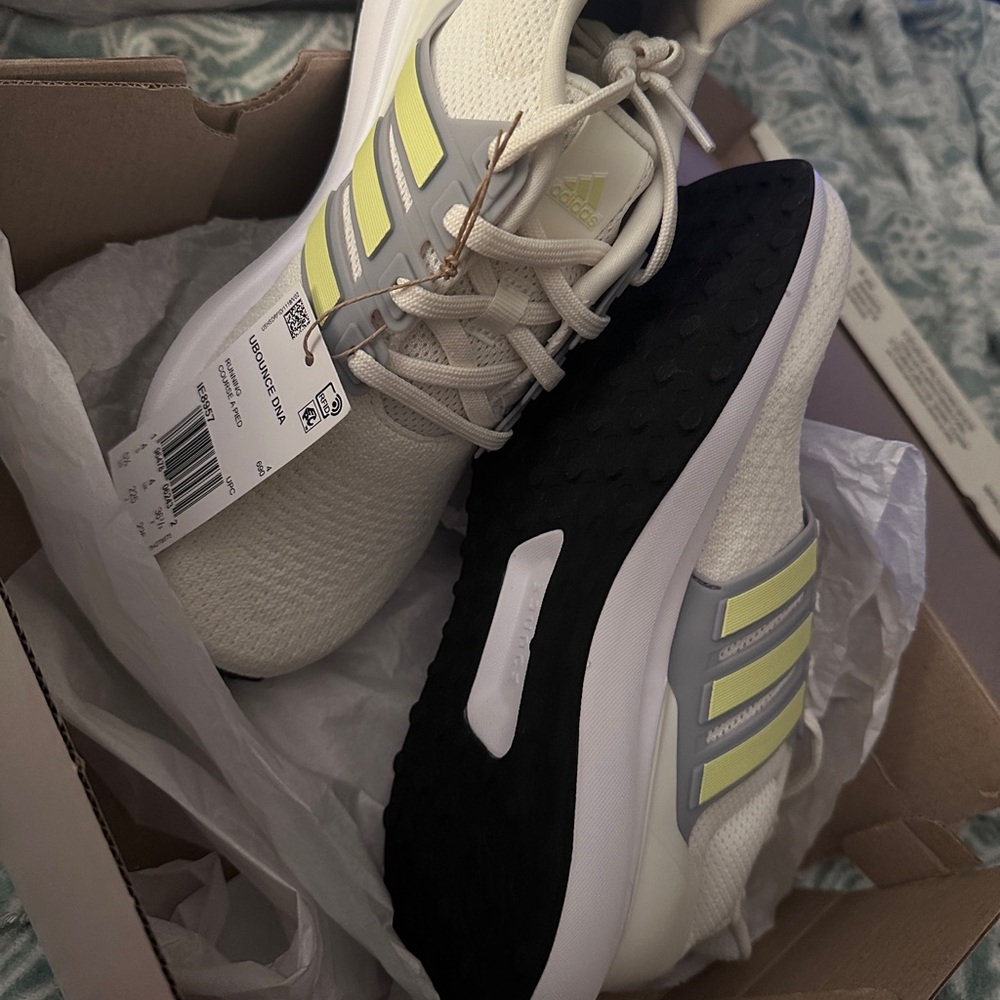 Women’s Adidas Ubounce DNA White and Ice Yellow Halo Silver  size 5.5